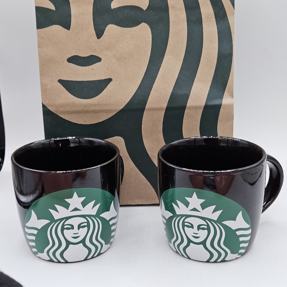 Set of black 14 ounce Starbucks mugs